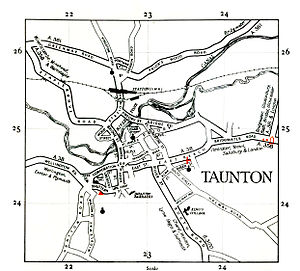 An old map showing the main roads and the river in the town.
