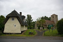 St Bartholomew's church with neighbouring thatched cottage - geograph.org.uk - 460340.jpg